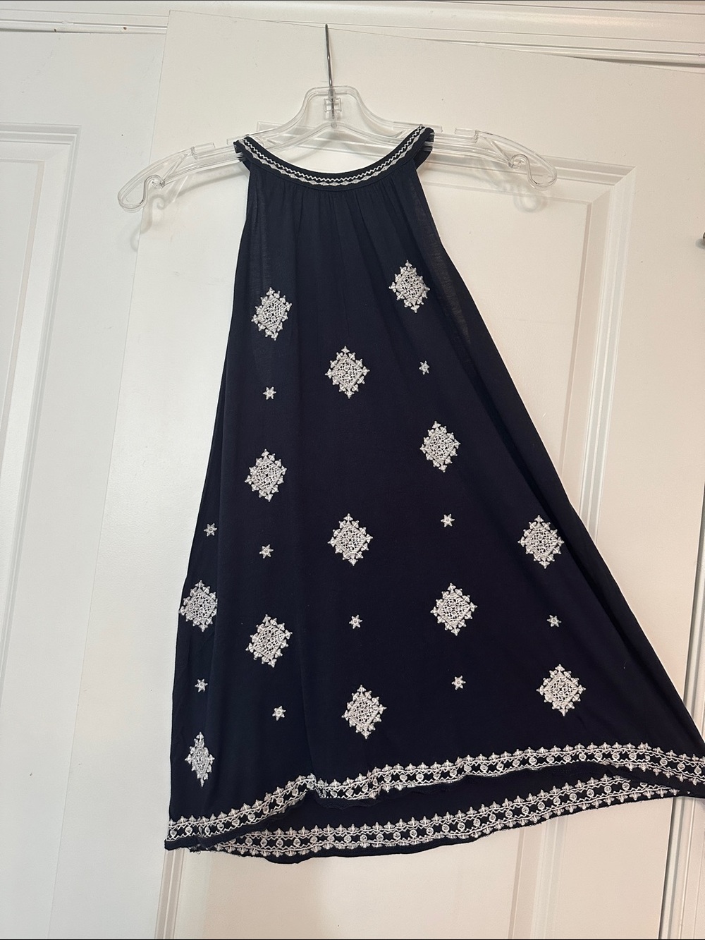 Loft size XSP Navy blue embroidered A-line halter top. Excellent Condition.
